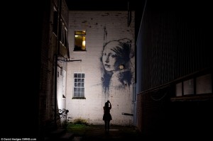 Karya Bansky "Girl with a Pierced Eardum" di Bristol, Inggris. (dailymail.co.uk/david hedges)